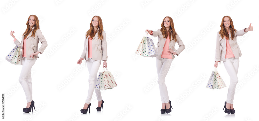 Young woman with shopping bags isolated on white Young woman with shopping bags isolated on white