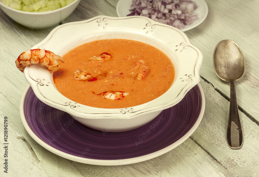 Photo of shrimp and tomato soup, with retro spoon Photo of shrimp and tomato soup, with retro spoon
