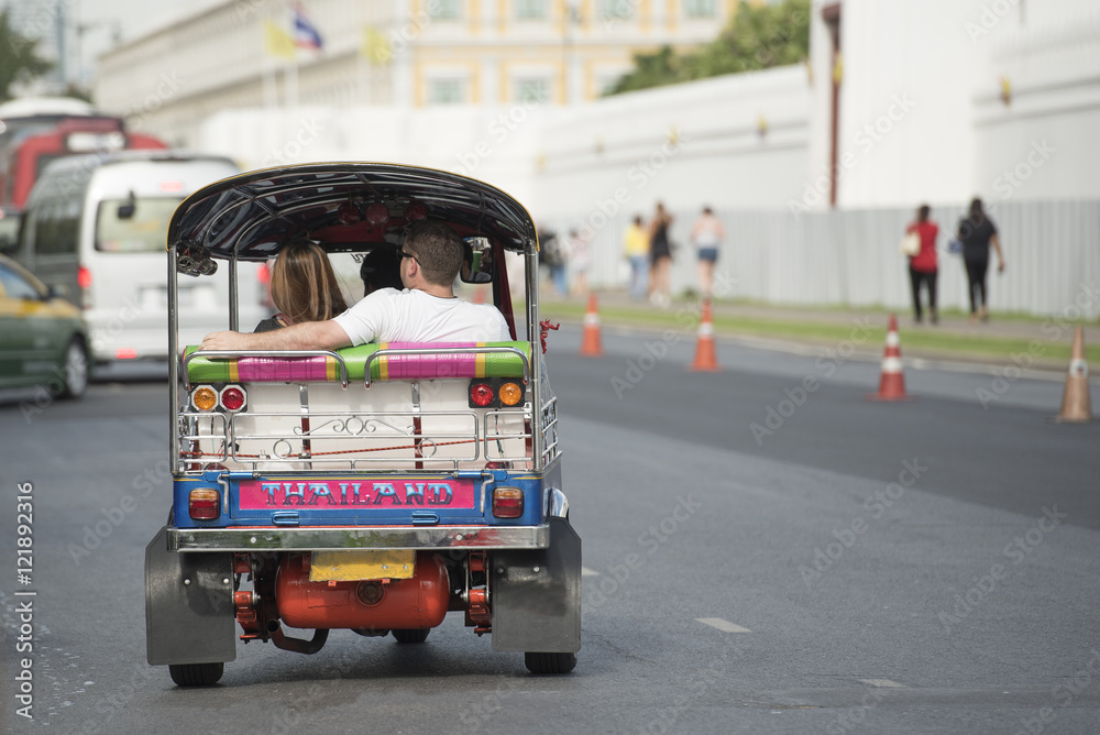 Tuk Tuk is parking in front of Wat Phra Kaeo or Grand Palace, Bangkok, Thailand