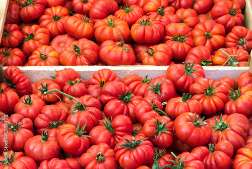 Ripped sicilian tomatoes for sale at a market in Palermo