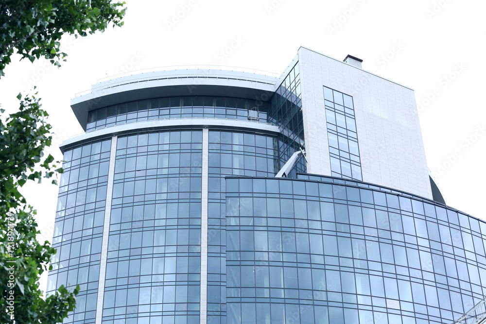 Fototapeta premium Modern skyscraper with panoramic windows