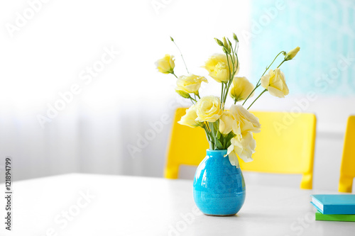 Bouquet of fresh eustoma flowers on table