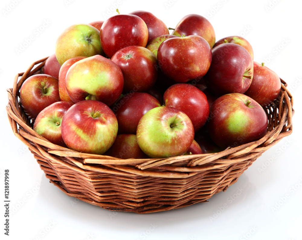 Basket with red apples on white background Basket with red apples on white background