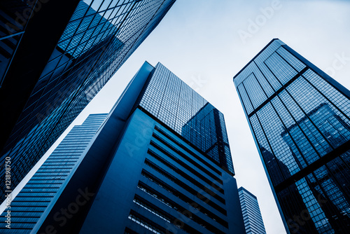 low angle view of modern metallic skyscrapers,blue toned,suzhou,china.