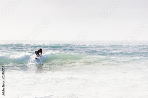 riding a wave in cornwall © jayfish