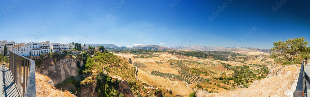 Sunny panoramic view of fields near Ronda, Andalusia province, Spain.