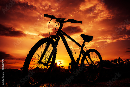 Beautiful close up scene of bicycle at sunset