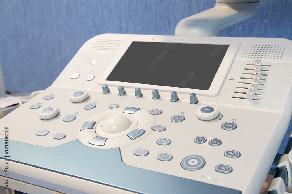 Medical ultrasound machine in a hospital diagnostic room. Modern Medical ultrasound machine in a hospital diagnostic room. Modern