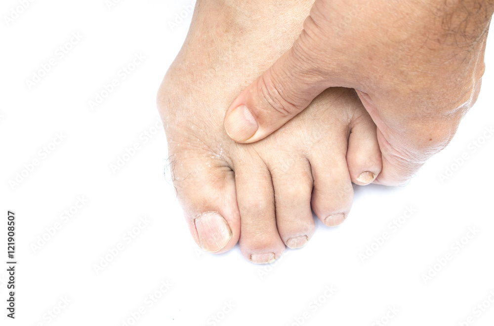 Caucasian male hand massaging foot isolated on white background Caucasian male hand massaging foot isolated on white background