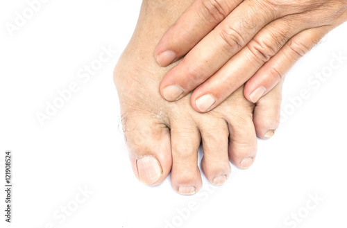 Caucasian male hand massaging foot isolated on white background