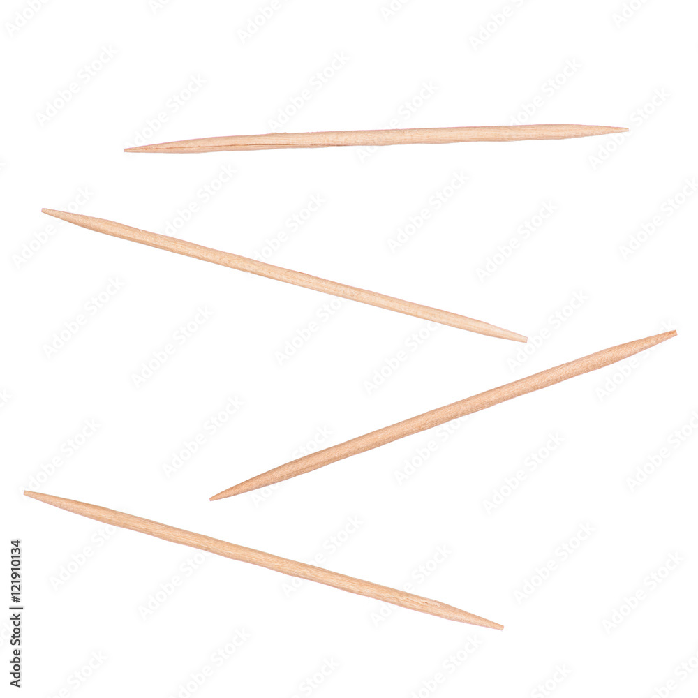 wooden toothpicks closeup on isolated white background wooden toothpicks closeup on isolated white background