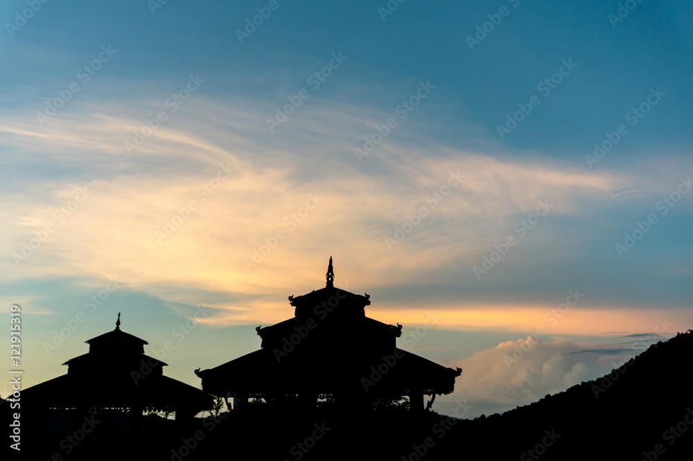 silhouette of Thai pavilion with senset sky