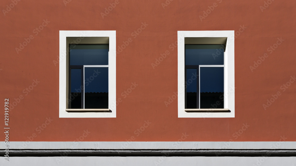 Windows in a red building