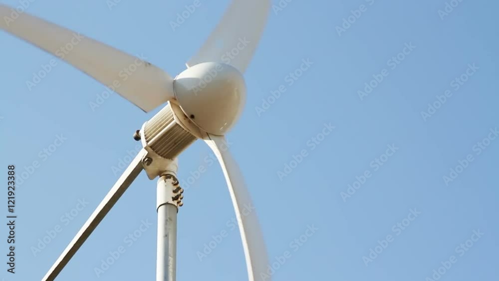 Row of wind power generator over blue sky Row of wind power generator over blue sky