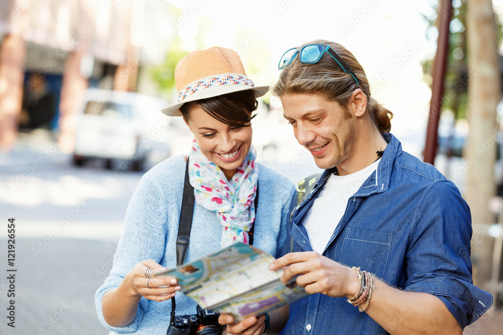 Girl and guy on the streets of a city