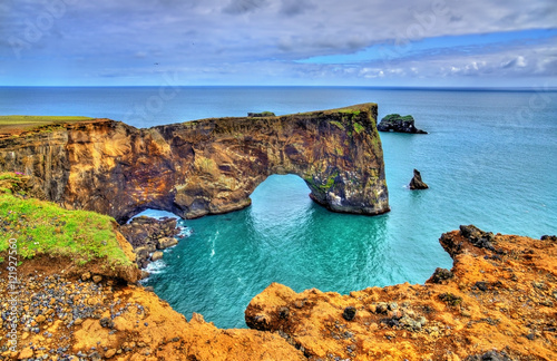 Natural arch of Dyrholaey Peninsula - Iceland photo