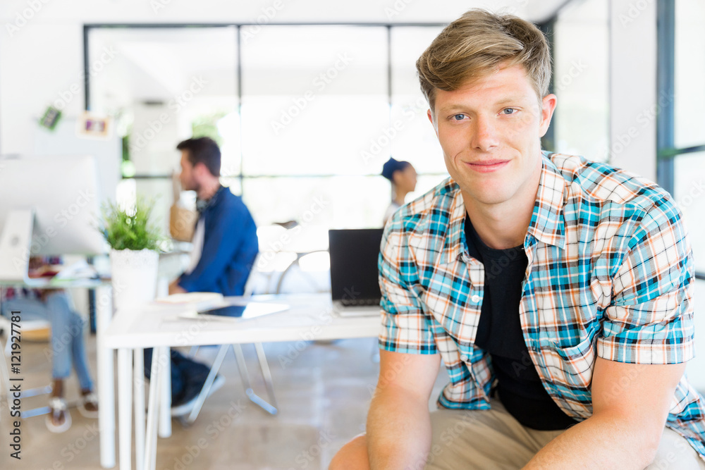 Young man working in office Young man working in office