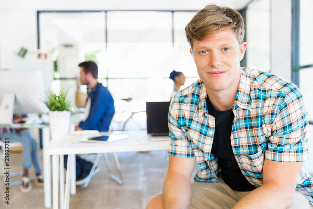 Young man working in office