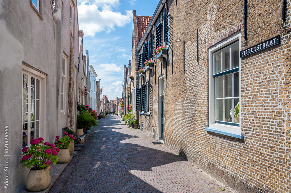 Narrow street in the small Dutch city of Goedereede
