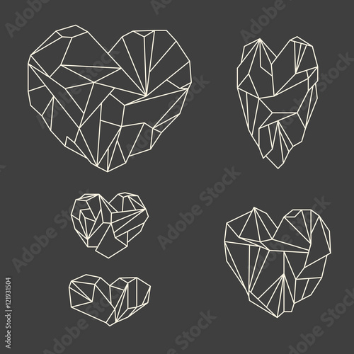 Set of mineral heart-shaped crystals on grey background