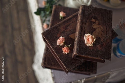 The ancient books stand on the wedding table