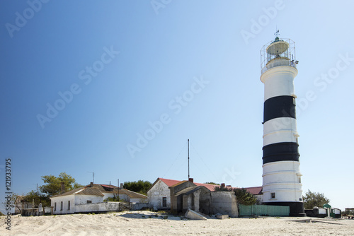 view to old lighthouse and blue sky
