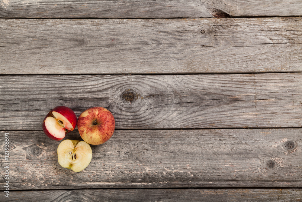 Apples on gray old planks wood table Apples on gray old planks wood table