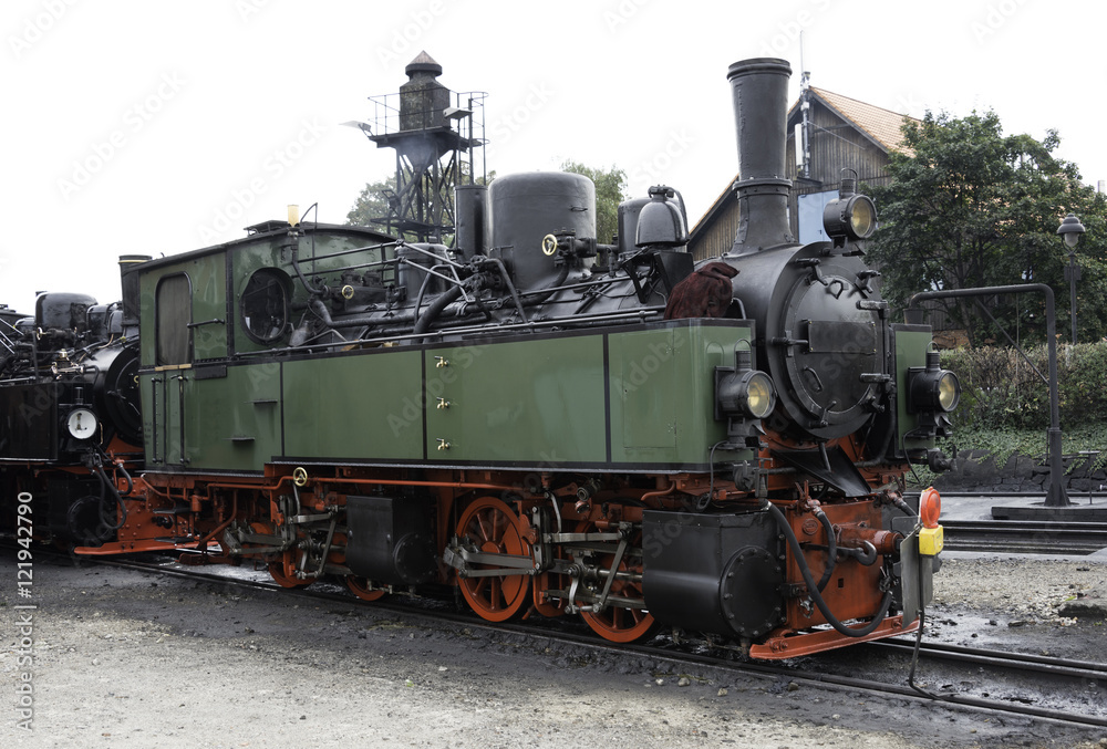 old green steam train in germany