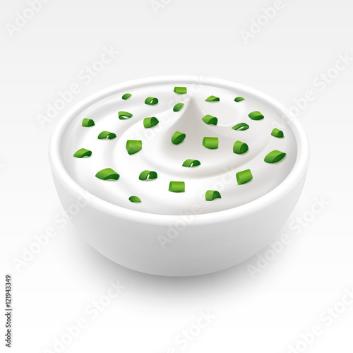 Bowl of Sour Cream Sauce Tartar Mayonnaise with Chopped Green Onion Isolated on White Background