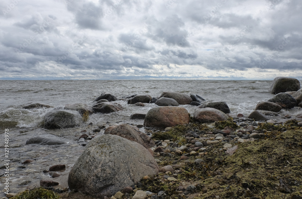Beach wavy Baltic Sea with boulders Beach wavy Baltic Sea with boulders