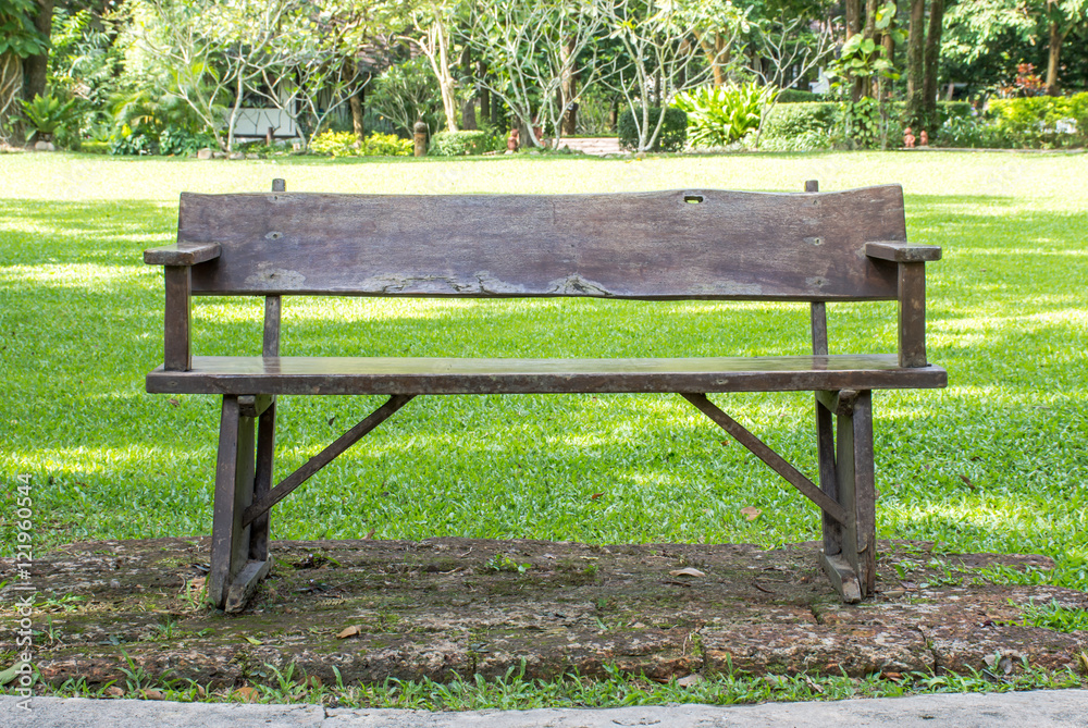 Wooden park bench in the garden