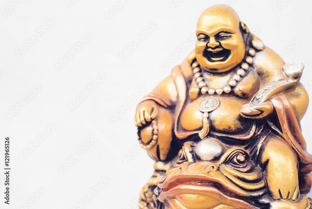 laughing golden Buddha on the toad