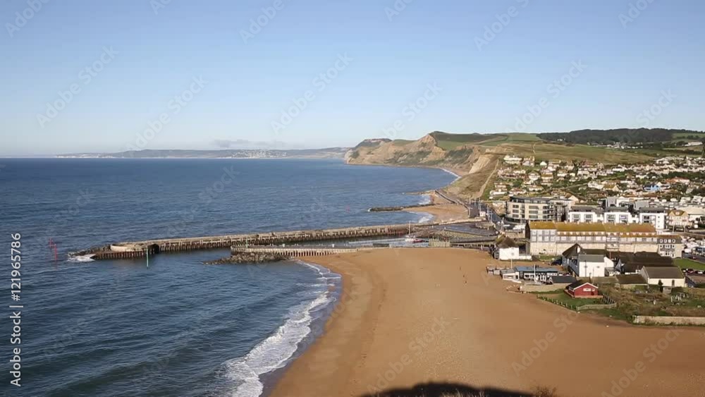 West Bay Dorset England uk Jurassic coast south of Bridport on a beautiful day with blue sky and sea West Bay Dorset England uk Jurassic coast south of Bridport on a beautiful day with blue sky and sea