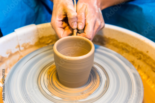 Pottering - creating a clay cup in process