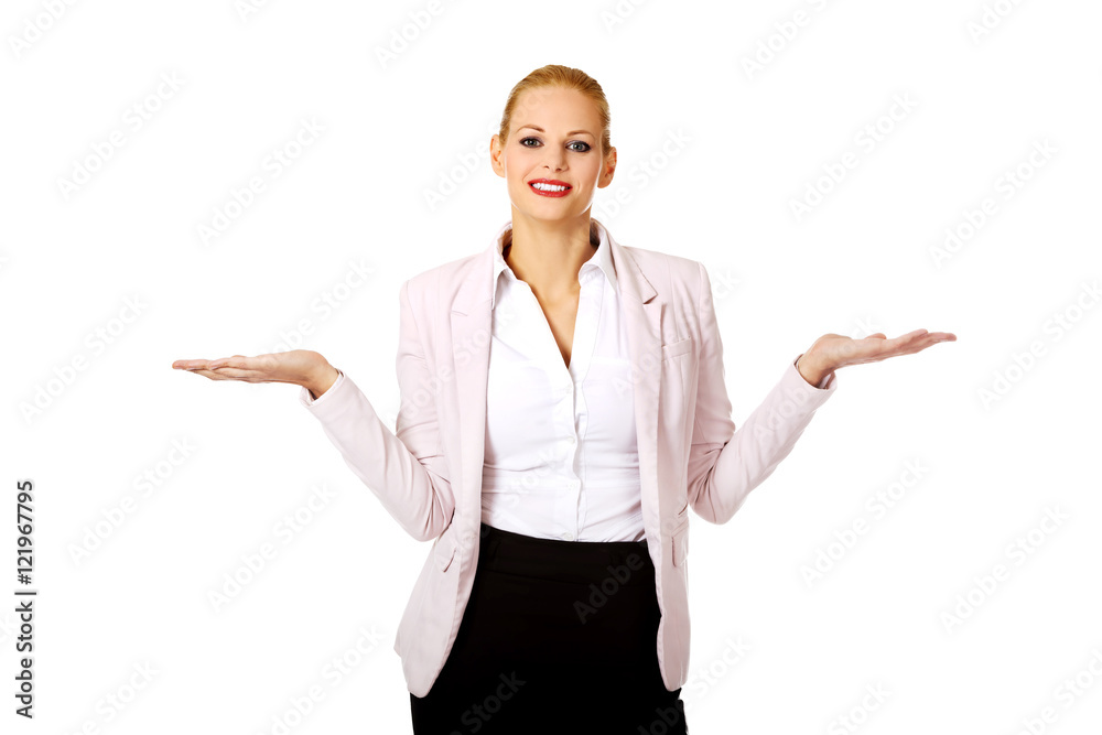 Business woman presenting something on open palm Business woman presenting something on open palm