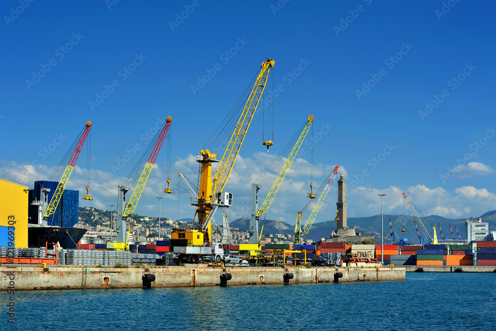 Cargo cranes with warehouse in Genova sea industrial port