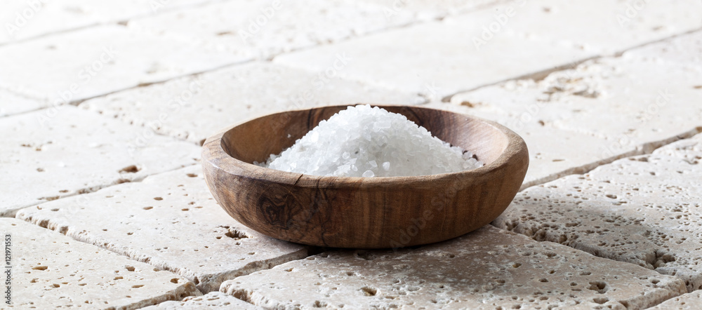 coarse salt in cup for concept of bath or cooking coarse salt in cup for concept of bath or cooking