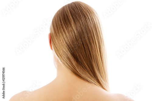 Blonde woman with healthy hair - isolated on white background.