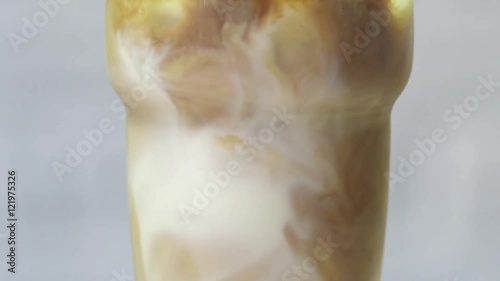 ice latte, rotating slow motion. Close up shot