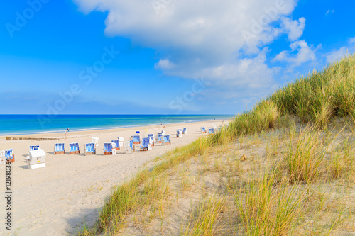 Grass sand dune and view of Kampen beach, Sylt island, Germany