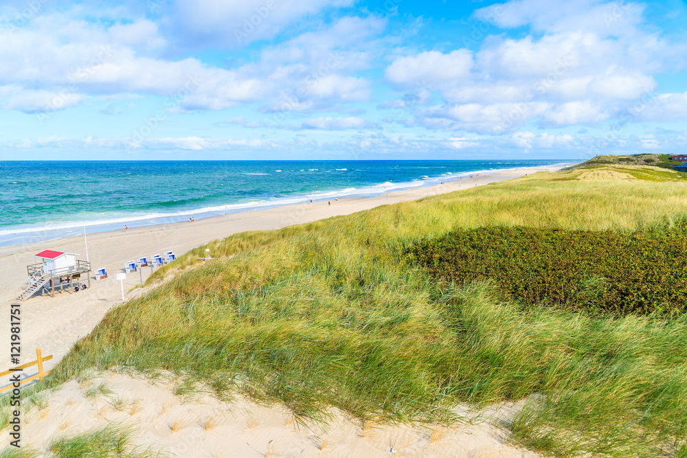View of beach and sand dunes in Wenningstedt village on Sylt island, Germany