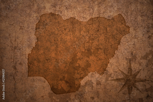 nigeria map on a old vintage crack paper background