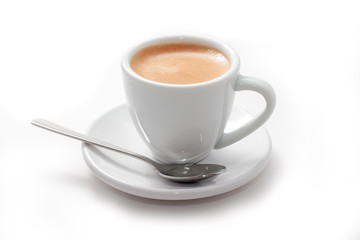 Cup of fresh brewed espresso with a spoon isolated on white background