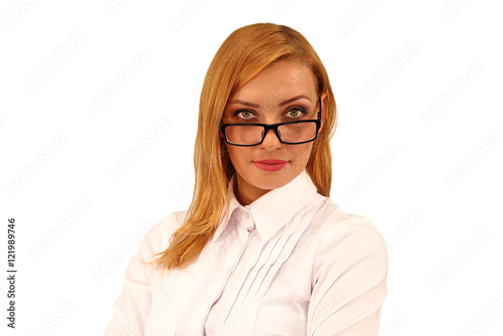 Beautiful young woman looking over her glasses at camera