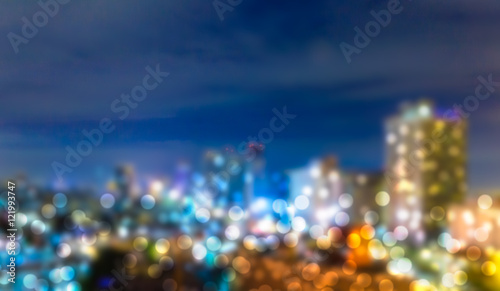Abstract bokeh cityscape night background.