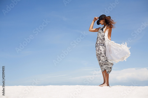 bohemian girl in hat outdoors