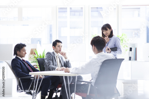 Young business people are meeting in a stylish office