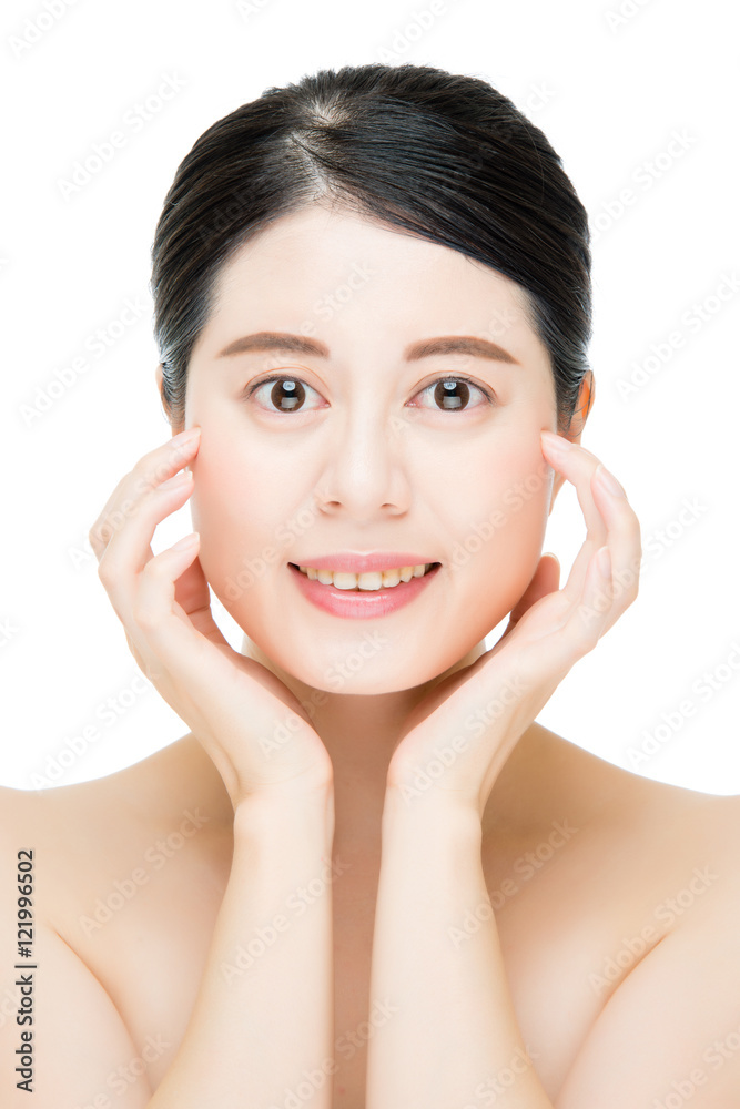 Beautiful woman touching her Face, looking at camera white Backg Beautiful woman touching her Face, looking at camera white Backg