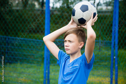 Boy throws a ball out