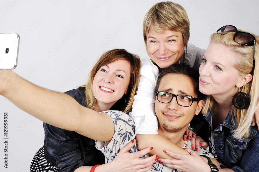 Selfie. Happy smiling young group looking at camera. isolated on white background. Selfie. Happy smiling young group looking at camera. isolated on white background.
